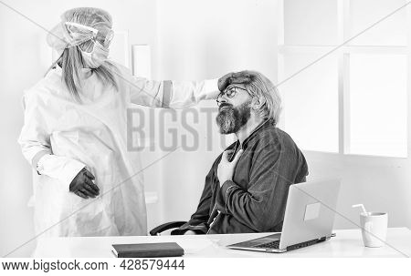 Coronavirus Symptoms. Doctor Protective Equipment Examines Male Patient Suspected Coronavirus Infect
