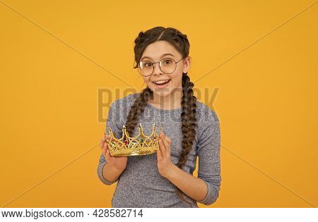 Cute Adorable Girl In Glasses. Princess Concept. Happy Smiling Princess. Excellent Pupil. Success An