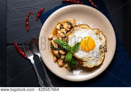 Thai Food Concept Khao Pad Krapao Kai Authentic Thai Basil Chicken Rice And Crispy Fried Egg Topping