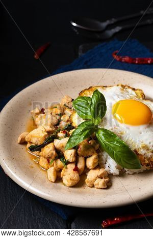 Thai Food Concept Khao Pad Krapao Kai Authentic Thai Basil Chicken Rice And Crispy Fried Egg Topping