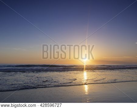 Beautiful Sunset Over The Clam Sea With Cloud Sky Background. Sunset Over Tropical Beach. Nature Sum