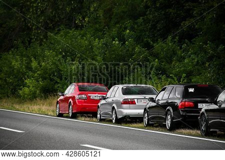 Chernigov, Ukraine - July 24, 2021: Saab Cars On The Road. Black Car Saab 9-5 Sportcombi And Saab 9-