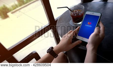Chiang Mai, Thailand, August 1, 2021: Shoppers Shopping Online Through Lazada With Iphone Xi At The 