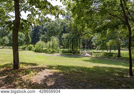 Beautiful Sunny Summer Day In A Green Park In Craiova, Romania