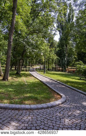 Beautiful Sunny Summer Day In A Green Park In Craiova, Romania