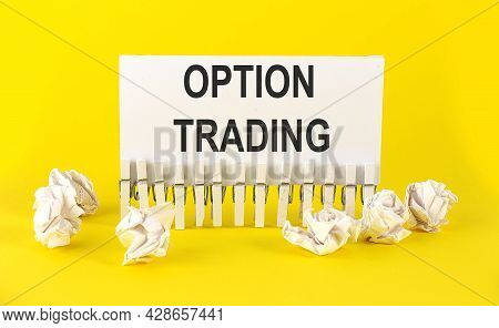 Text Option Trading On The White Short Note Paper On Tthe Yellow Background