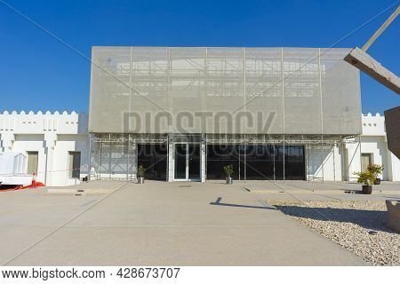 Doha, Qatar - Nov 23, 2019 : Mathaf Arab Museum Of Modern Art With Blue Sky In Doha, Qatar On Nov 23