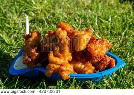 Portion Of Diep-fried Cod Fish Pieces Served With Remoulade Sauce