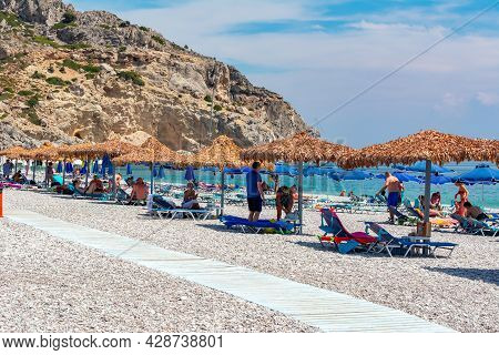 Rhodes, Greece - September 2019: Umbrellas And Sunbeds On Traganou Beach, Rhodes Island