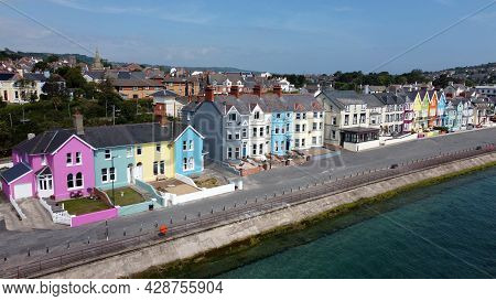 Yellow Red Orange Green Blue Sky Houses By The Sea Aerial Whitehead N. Ireland
