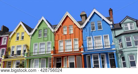 Yellow Red Orange Green Blue Sky Houses By The Sea Whitehead In N. Ireland