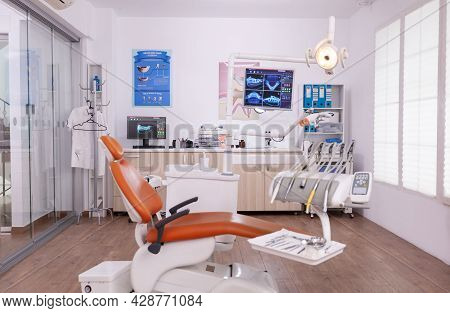 Interior Of Empty Professional Modern Stomatology Hospital Office Ready For Dental Tooth Surgery. Or