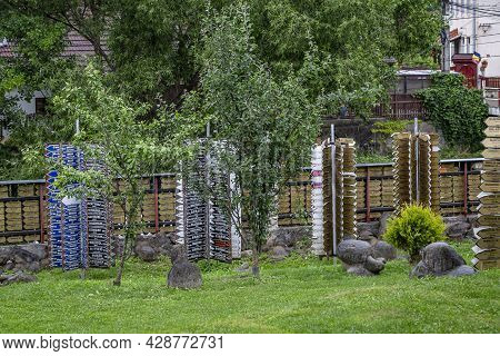 Criseni, Harghita, Romania-june 20: Decorative Indicators In The Courtyard Of The Straw Hat Museum O