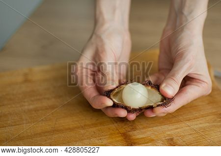 Ripe Rambutan And Leechy Or Lychee Fruits On Wooden Table. Healthy Food, Fresh Organic Fruit.