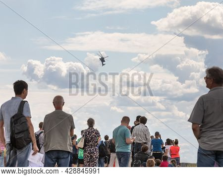 25.07.2021, Russia, Zhukovsky. Spectators At The Maks Air Show Photograph The Performance Of A Helic