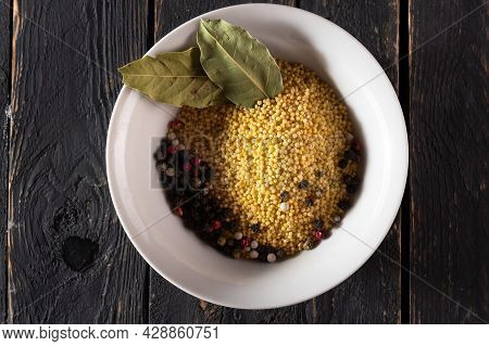 Millet And Spices. Millet And Bay Leaves. Millet For Cooking Porridge. Millet In A Plate. View From 