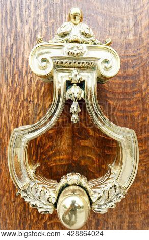 European Vintage Old Metal Wrought Iron Door Knocker. Design Detail. Paris.