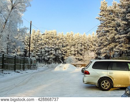Krasnoyarsk, Russia - February 10, 2019: Cars In The Parking Lot. Winter On The Outskirts Of The For