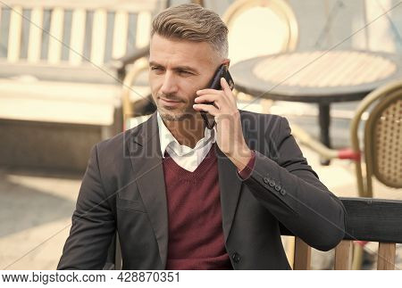 Youre Never Alone With Cellphone. Businessman Make Phone Call Outdoors. Call Answering. Phone Conver