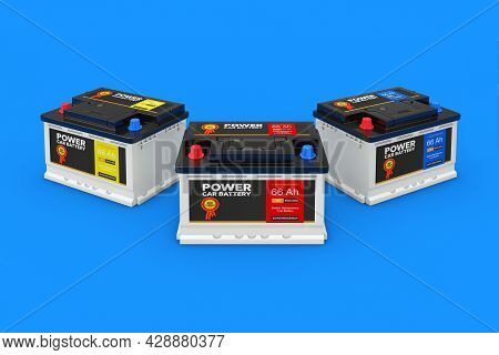 Rechargeable Car Battery 12v Accumulators With Abstract Labels On A Blue Background Extreme Closeup.