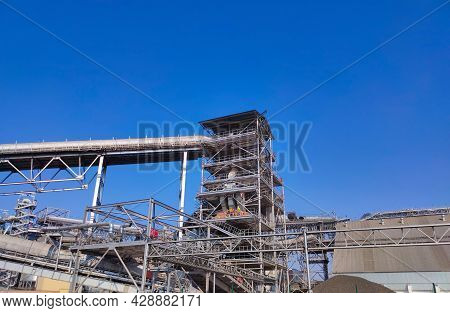 Loading Corn For Storage At A Grain Elevator And Blue Sky