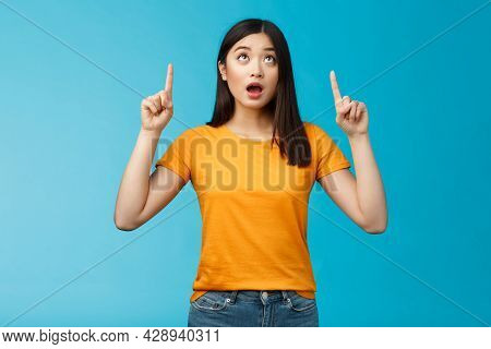 Surprised Impressed Asian Girl Dark Short Hairstyle Drop Jaw, Gasping Amazed Look Pointing Up Astoni