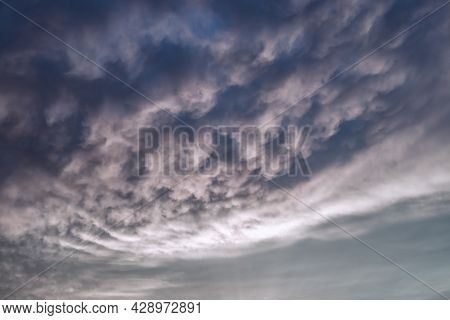 Dark Dramatic Clouds In The Evening Sky. Thunderclouds In Bad Weather. Atmospheric Mood. Background 