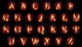 set of fire burning latin alphabet letters