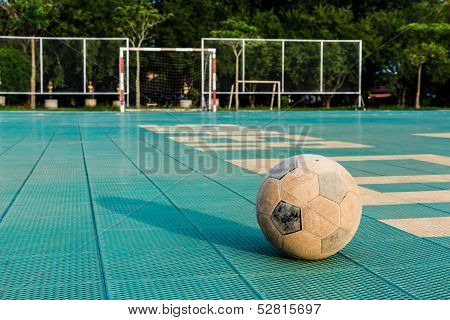 Old Football And Its Shadow