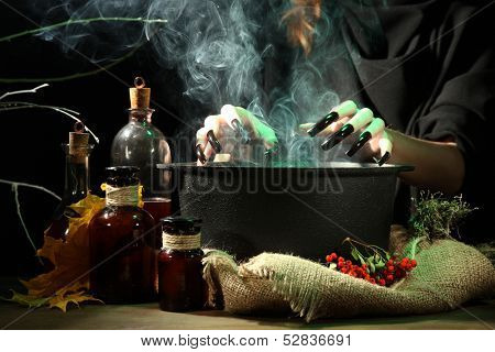  Witch in scary Halloween laboratory on dark color background