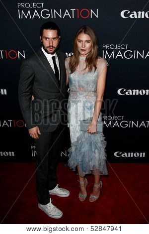 NEW YORK- OCT 24: Phil Winser (L) and Dree Hemingway attend the premiere of Canon's 