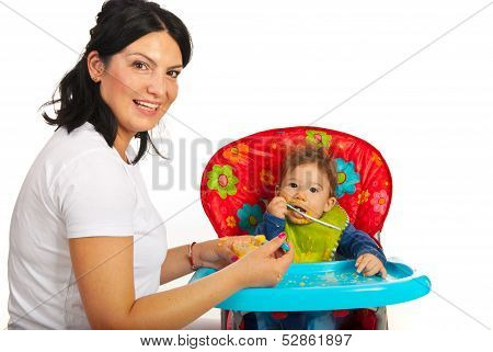 Mother Feed Her Baby Boy