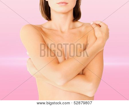 health, medicine, beauty concept - topless woman with perfect skin and hands over breast