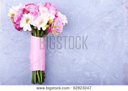 Beautiful wedding bouquet on wooden background