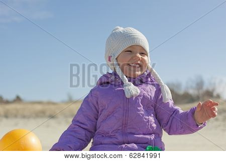 Cheerful child girl outdoor