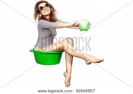 Girl sitting in a basin rides.