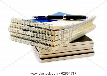 Pile Of Notebooks Isolated On A White Background