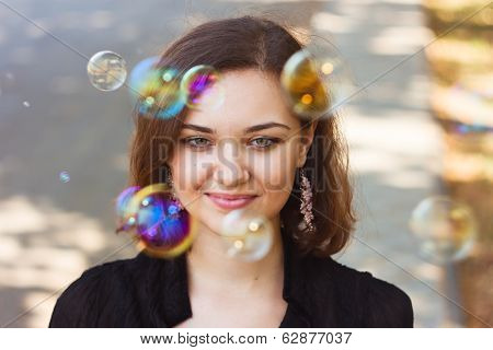 Girl and soap bubbles