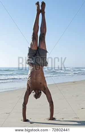 Straight Handstand On Beach