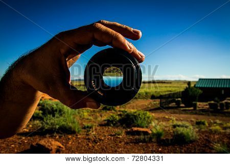 Holding a lens