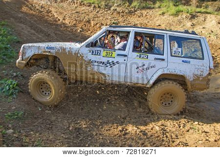 Dynamic Shot Of The White Off Road Car