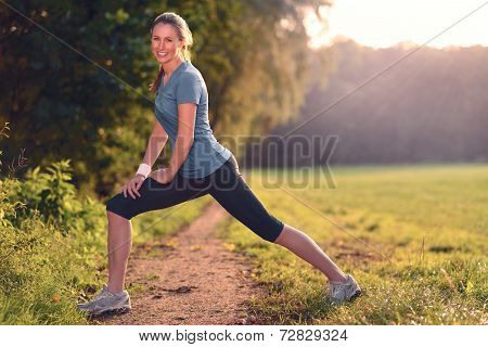 Young Woman Doing Stretching Exercises
