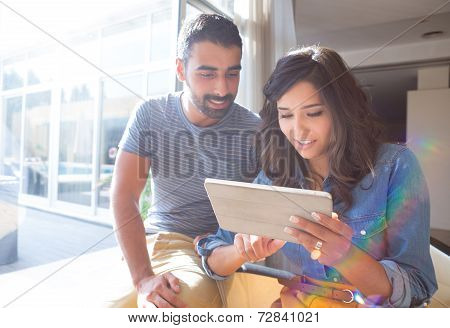 Couple Using Tablet