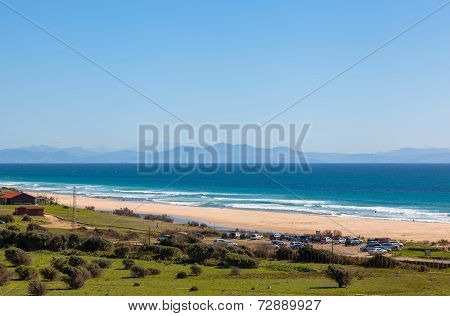 Bolonia Beach, Morroco Mountain In Background