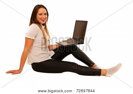 Happy Asian Caucasian Girl Lerning In Study Woth Lots Of Books On The Table