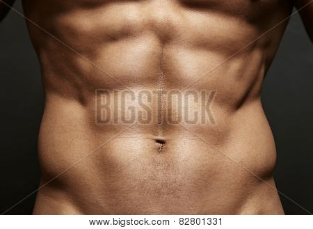 Closeup Photo Of An Athlete With Perfect Abs