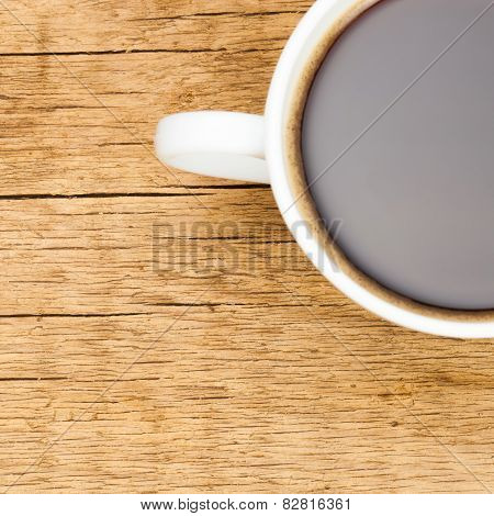 White Ceramic Coffee Cup On Wooden Table