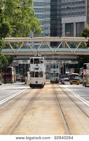 HONG KONG - JUNE 03, 2015: double-decker tram on street of HK. Hong Kong Tramways is a tram system in Hong Kong, being one of the earliest forms of public transport in the metropolis.