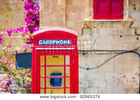 red cardphone in a steet of Valletta in Malta