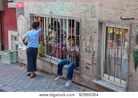 Turkish Kids Hanging Out Along The Street